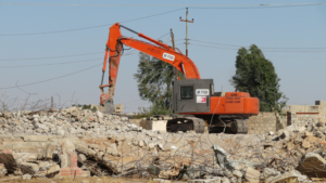 Armoured construction machine used to clear rubbles